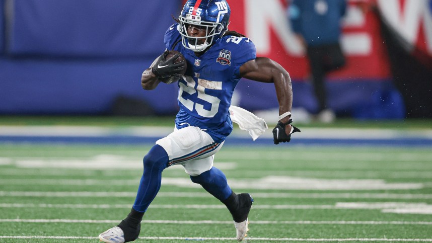 Aug 8, 2024; East Rutherford, New Jersey, USA; New York Giants running back Dante Miller (25) carries the ball during the second half against the Detroit Lions at MetLife Stadium. Mandatory Credit: Vincent Carchietta-USA TODAY Sports