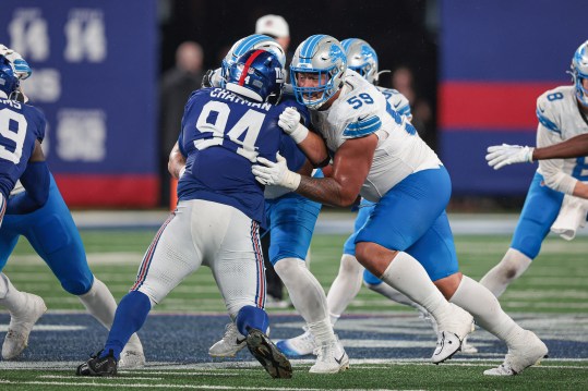 Aug 8, 2024; East Rutherford, New Jersey, USA; Detroit Lions offensive tackle Giovanni Manu (59) blocks New York Giants defensive tackle Elijah Chatman (94) during the second half at MetLife Stadium. Mandatory Credit: Vincent Carchietta-USA TODAY Sports