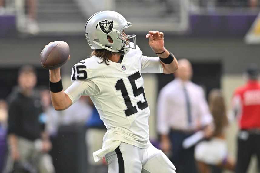 Aug 10, 2024; Minneapolis, Minnesota, USA; Las Vegas Raiders quarterback Gardner Minshew (15) throws a pass against the Minnesota Vikings during the second quarter at U.S. Bank Stadium. Mandatory Credit: Jeffrey Becker-USA TODAY Sports