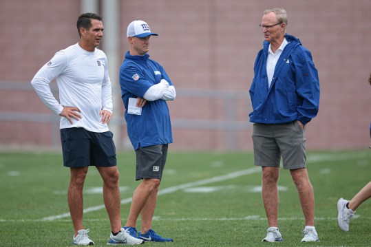 Jul 24, 2024; East Rutherford, NJ, USA; New York Giants  general manager Joe Schoen, left, and director of player personnel Tim McDonnell, center, and president and CEO John Mara, right, looks on during training camp at Quest Diagnostics Training Facility. Mandatory Credit: Vincent Carchietta-USA TODAY Sports