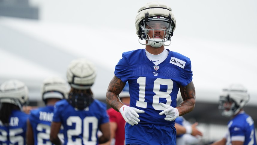 Jul 25, 2024; East Rutherford, NY, USA; New York Giants wide receiver Isaiah Hodgins (18) jogs onto the field during training camp at Quest Diagnostics Training Center. Mandatory Credit: Lucas Boland-USA TODAY Sports