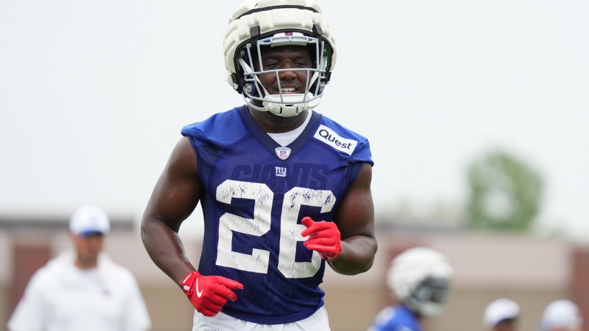 Jul 25, 2024; East Rutherford, NY, USA; New York Giants running back Devin Singletary (26) participates in a drill during training camp at Quest Diagnostics Training Center. Mandatory Credit: Lucas Boland-USA TODAY Sports