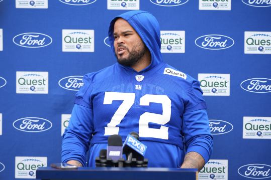 Jul 25, 2024; East Rutherford, NY, USA; New York Giants offensive guard Jermaine Eluemunor (72) gives an interview after training camp at Quest Diagnostics Training Center. Mandatory Credit: Lucas Boland-USA TODAY Sports