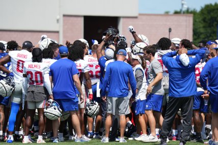 Jul 26, 2024; East Rutherford, NJ, USA; New York Giants players huddle at the end of training camp at Quest Diagnostics Training Center. Mandatory Credit: Lucas Boland-USA TODAY Sports