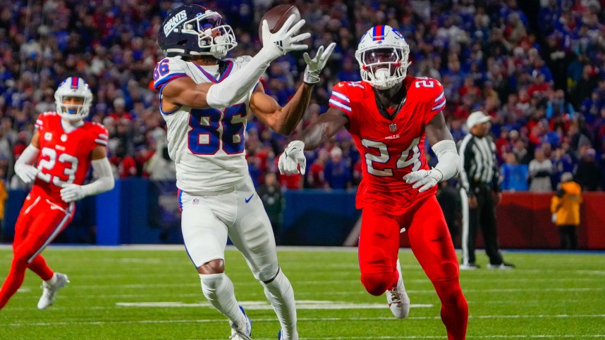 Oct 15, 2023; Orchard Park, New York, USA; New York Giants wide receiver Darius Slayton (86) makes a catch against Buffalo Bills cornerback Kaiir Elam (24) during the first half at Highmark Stadium. Mandatory Credit: Gregory Fisher-USA TODAY Sports