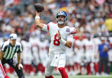 Aug 17, 2024; Houston, Texas, USA; New York Giants quarterback Daniel Jones (8) attempts a pass during the second quarter against the Houston Texans at NRG Stadium. Mandatory Credit: Troy Taormina-USA TODAY Sports