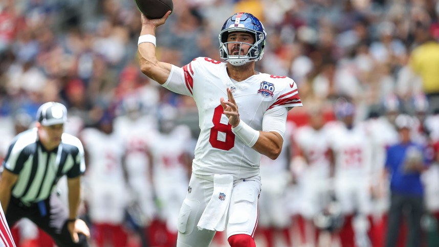 Aug 17, 2024; Houston, Texas, USA; New York Giants quarterback Daniel Jones (8) attempts a pass during the second quarter against the Houston Texans at NRG Stadium. Mandatory Credit: Troy Taormina-USA TODAY Sports