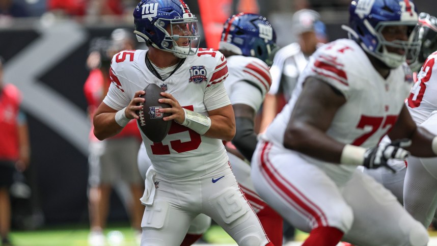 Aug 17, 2024; Houston, Texas, USA; New York Giants quarterback Tommy DeVito (15) in action during the game against the Houston Texans at NRG Stadium. Mandatory Credit: Troy Taormina-USA TODAY Sports