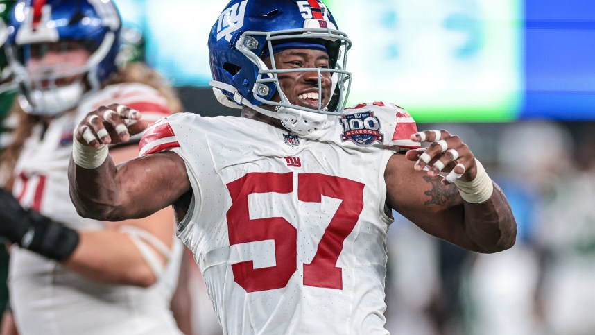 Aug 24, 2024; East Rutherford, New Jersey, USA; New York Giants linebacker K.J. Cloyd celebrates after a defensive stop against the New York Jets during the second half at MetLife Stadium. Mandatory Credit: Vincent Carchietta-USA TODAY Sports