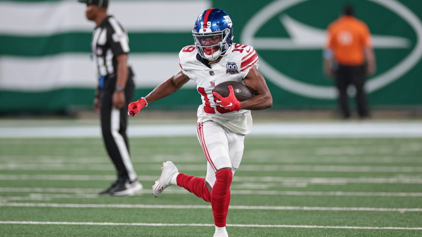 Aug 24, 2024; East Rutherford, New Jersey, USA; New York Giants wide receiver Ayir Asante (19) gains yards after catch during the second half against the New York Jets at MetLife Stadium. Mandatory Credit: Vincent Carchietta-USA TODAY Sports