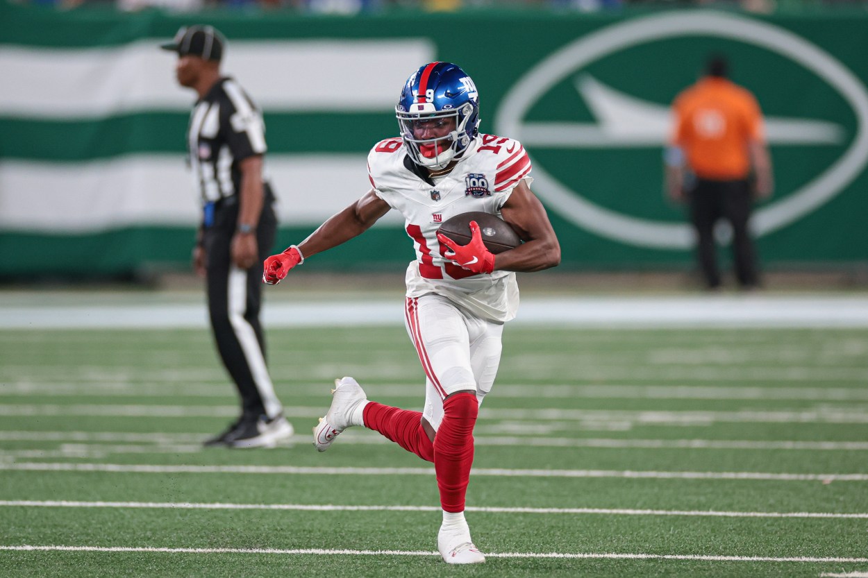 Aug 24, 2024; East Rutherford, New Jersey, USA; New York Giants wide receiver Ayir Asante (19) gains yards after catch during the second half against the New York Jets at MetLife Stadium. Mandatory Credit: Vincent Carchietta-USA TODAY Sports