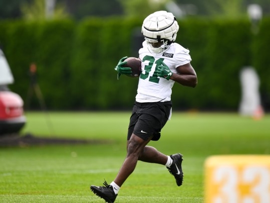 Jul 25, 2024; Florham Park, NJ, USA; New York Jets running back Tarik Cohen (31) participates in a drill during training camp at Atlantic Health Jets Training Center. Mandatory Credit: John Jones-USA TODAY Sports