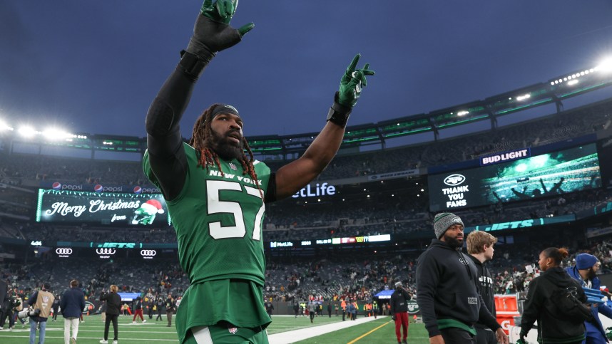 Dec 24, 2023; East Rutherford, New Jersey, USA; New York Jets linebacker C.J. Mosley (57) gestures to fans after the game against the Washington Commanders at MetLife Stadium. Mandatory Credit: Vincent Carchietta-USA TODAY Sports