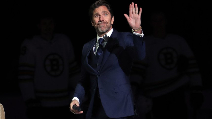 Nov 25, 2023; New York, New York, USA; Former New York Rangers goalie and recent Hockey Hall of Fame Henrik Lundqvist smiles during a ceremony with his daughter before the first period of a game between the Rangers and Boston Bruins at Madison Square Garden. Mandatory Credit: Danny Wild-USA TODAY Sports