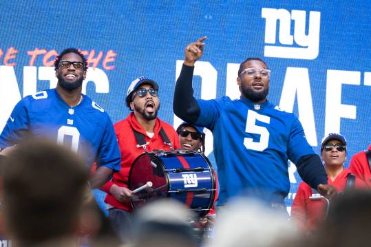 Apr 25, 2024; East Rutherford, NJ, USA; (Left) NY Giants #0 Brian Burns and #5 Kayvon Thibodeaux during the NY Giants and NY Jets draft party at MetLife Stadium.