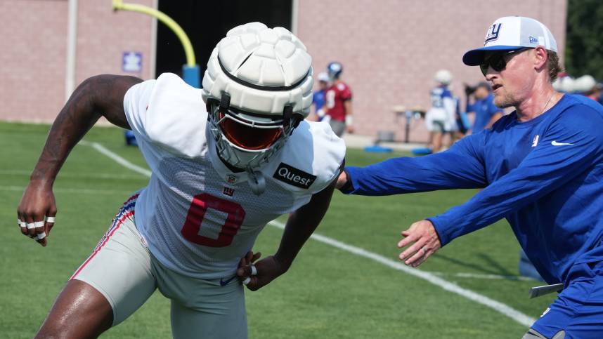 East Rutherford, NJ -- August 1, 2024 -- Linebacker Brian Burns with outside linebacker coach Charlie Bullen practicing today at training camp for the New York Giants.