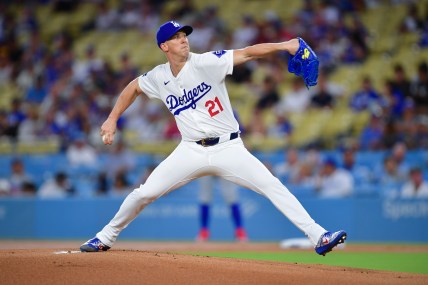 Sep 9, 2024; Los Angeles, California, USA; Los Angeles Dodgers pitcher Walker Buehler (21) throws against the Chicago Cubs during the first inning at Dodger Stadium. Mandatory Credit: Gary A. Vasquez-Imagn Images