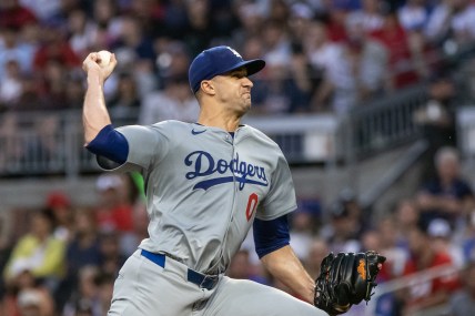 Sep 14, 2024; Cumberland, Georgia, USA; Los Angeles Dodgers pitcher Jack Flaherty (0) pitches the ball against the Atlanta Braves during the first inning at Truist Park. Mandatory Credit: Jordan Godfree-Imagn Images