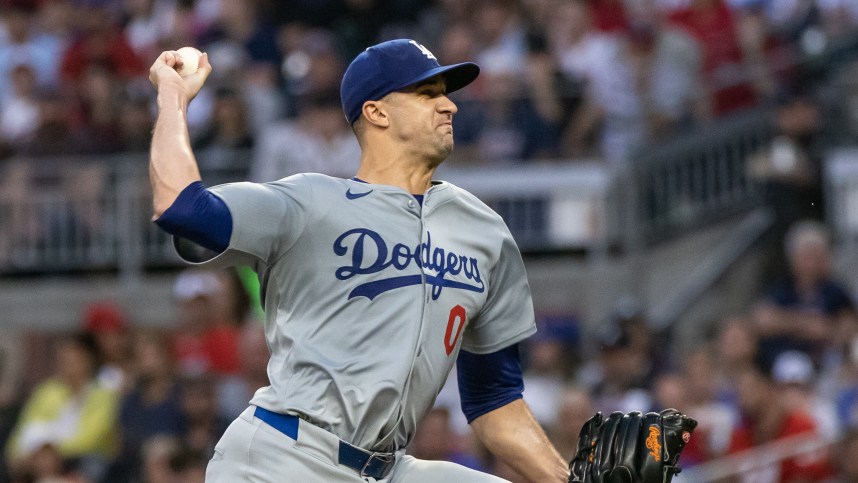 Sep 14, 2024; Cumberland, Georgia, USA; Los Angeles Dodgers pitcher Jack Flaherty (0) pitches the ball against the Atlanta Braves during the first inning at Truist Park. Mandatory Credit: Jordan Godfree-Imagn Images