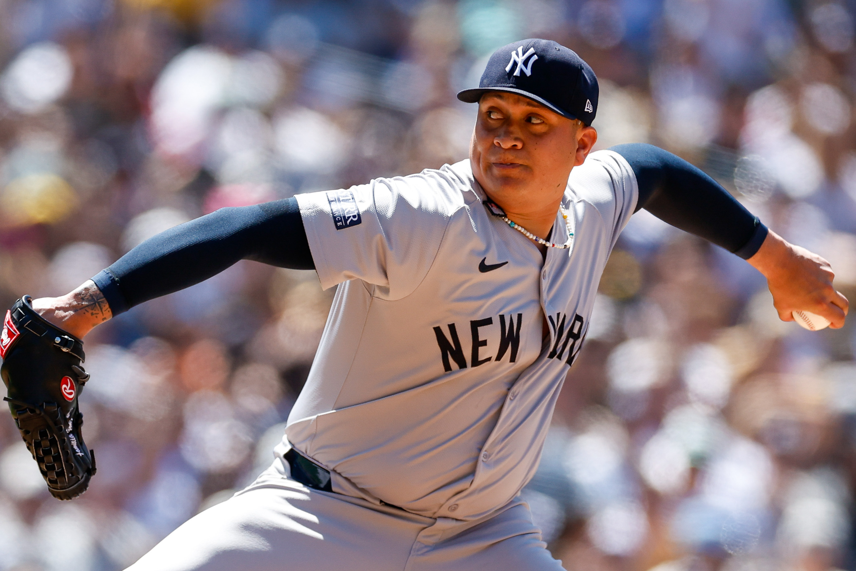 May 26, 2024; San Diego, California, USA; New York Yankees relief pitcher Victor Gonzalez (47) throws a pitch during the sixth inning against the San Diego Padres at Petco Park. Mandatory Credit: David Frerker-Imagn Images