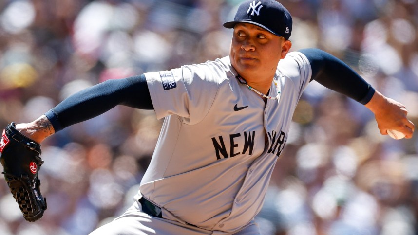 May 26, 2024; San Diego, California, USA; New York Yankees relief pitcher Victor Gonzalez (47) throws a pitch during the sixth inning against the San Diego Padres at Petco Park. Mandatory Credit: David Frerker-Imagn Images