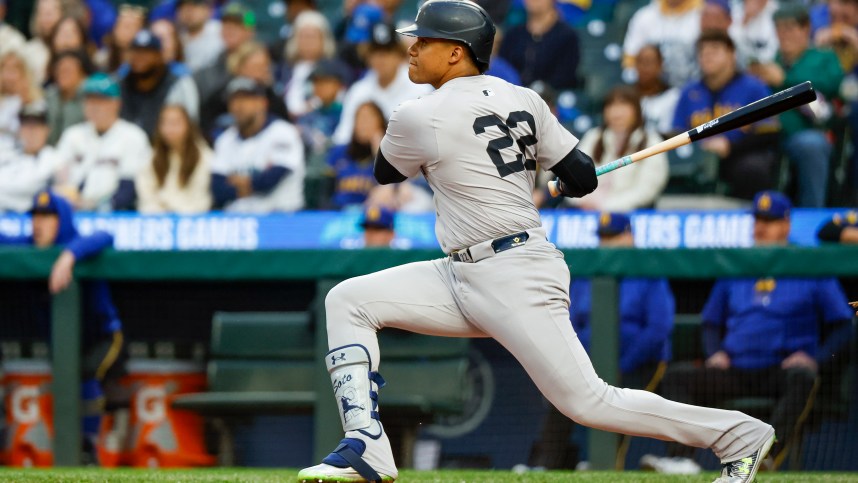 Sep 17, 2024; Seattle, Washington, USA; New York Yankees right fielder Juan Soto (22) hits a double against the Seattle Mariners during the first inning at T-Mobile Park. Mandatory Credit: Joe Nicholson-Imagn Images