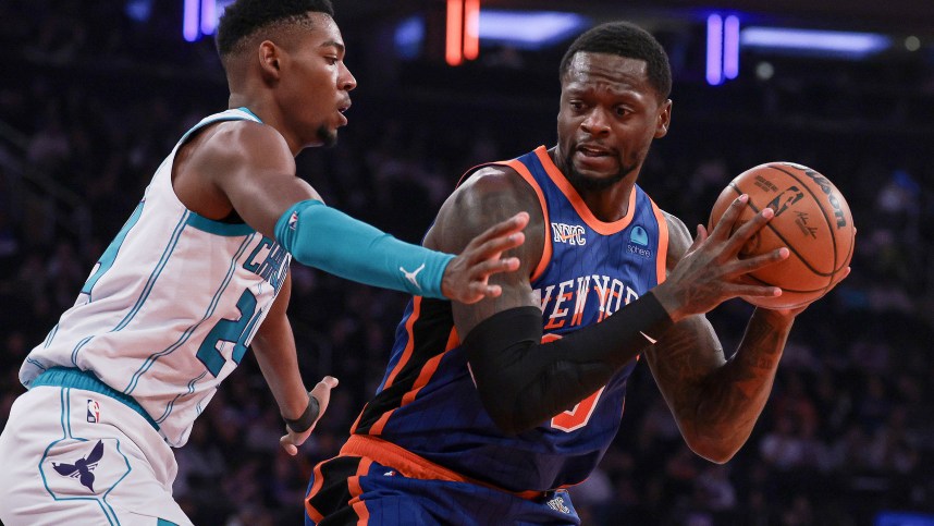 Nov 28, 2023; New York, New York, USA; New York Knicks forward Julius Randle (30) is defended by Charlotte Hornets forward Brandon Miller (24) during the first quarter at Madison Square Garden. Mandatory Credit: Vincent Carchietta-Imagn Images