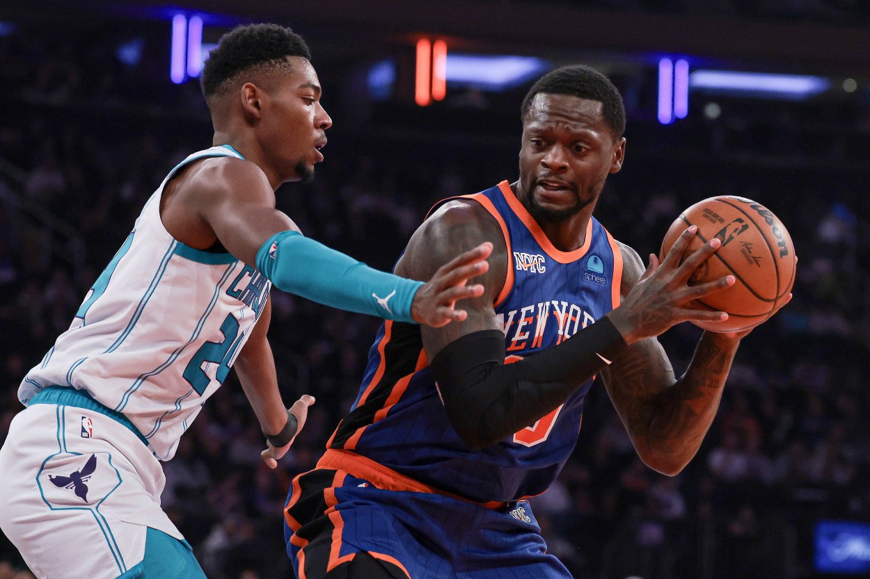 Nov 28, 2023; New York, New York, USA; New York Knicks forward Julius Randle (30) is defended by Charlotte Hornets forward Brandon Miller (24) during the first quarter at Madison Square Garden. Mandatory Credit: Vincent Carchietta-Imagn Images