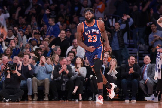 Nov 28, 2023; New York, New York, USA; New York Knicks center Mitchell Robinson (23) reacts after a dunk during the second half against the Charlotte Hornets at Madison Square Garden. Mandatory Credit: Vincent Carchietta-Imagn Images