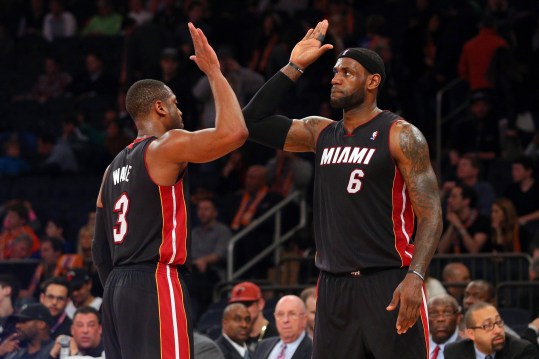 Feb 1, 2014; New York, NY, USA; Miami Heat small forward LeBron James (6) high fives Heat shooting guard Dwyane Wade (3) during the fourth quarter of a game against the New York Knicks at Madison Square Garden. The Heat defeated the Knicks 106-91. Mandatory Credit: Brad Penner-Imagn Images