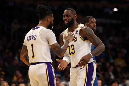 Mar 10, 2024; Los Angeles, California, USA;  Los Angeles Lakers forward LeBron James (23) greets guard D'Angelo Russell (1) after Russell scored a basket during the second quarter against the Minnesota Timberwolves at Crypto.com Arena. Mandatory Credit: Kiyoshi Mio-Imagn Images