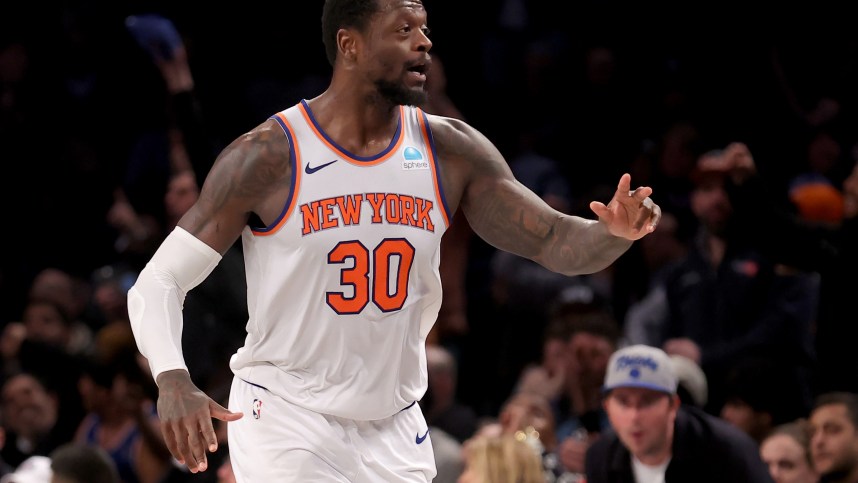 Jan 23, 2024; Brooklyn, New York, USA; New York Knicks forward Julius Randle (30) celebrates his three point shot against the Brooklyn Nets during the fourth quarter at Barclays Center. Mandatory Credit: Brad Penner-Imagn Images