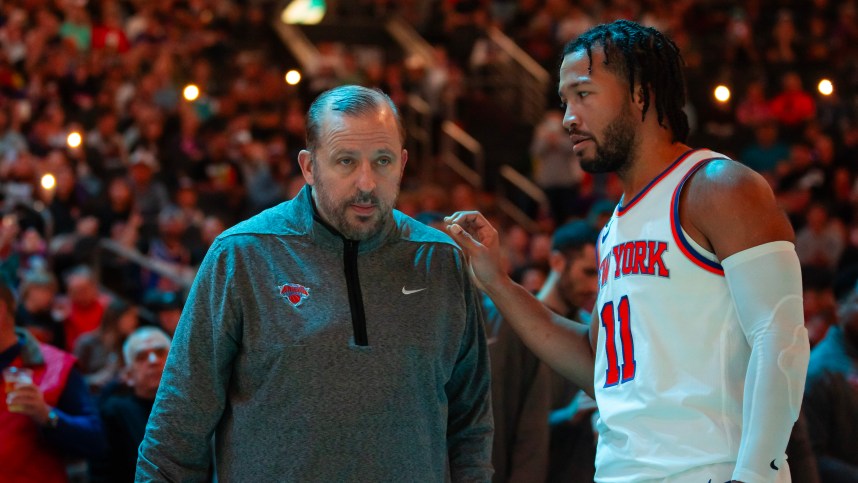 Nov 20, 2022; Phoenix, Arizona, USA; New York Knicks head coach Tom Thibodeau with guard Jalen Brunson (11) against the Phoenix Suns at Footprint Center. Mandatory Credit: Mark J. Rebilas-Imagn Images