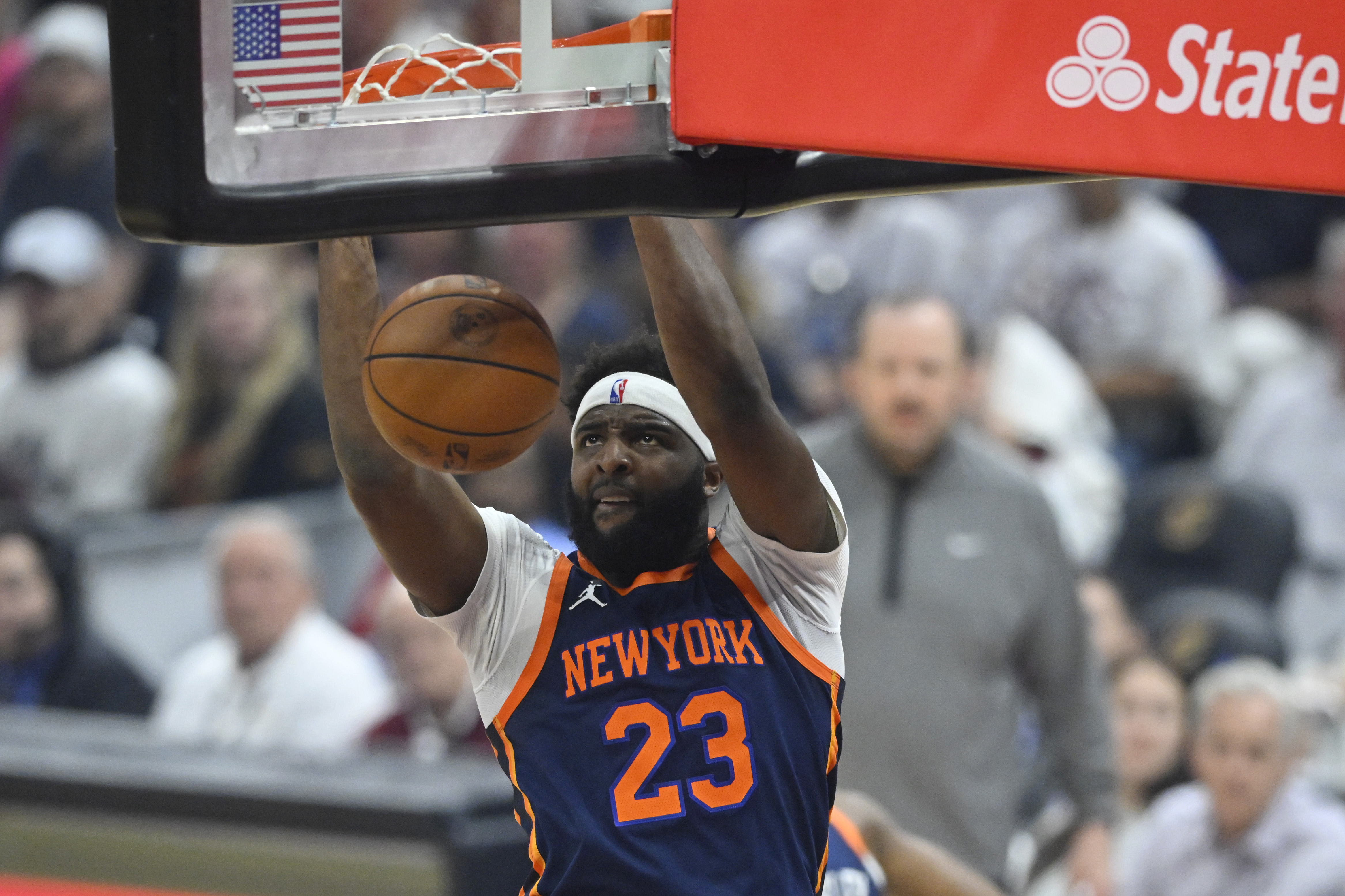 Apr 15, 2023; Cleveland, Ohio, USA; New York Knicks center Mitchell Robinson (23) dunks against the Cleveland Cavaliers in the first quarter of game one of the 2023 NBA playoffs at Rocket Mortgage FieldHouse. Mandatory Credit: David Richard-Imagn Images