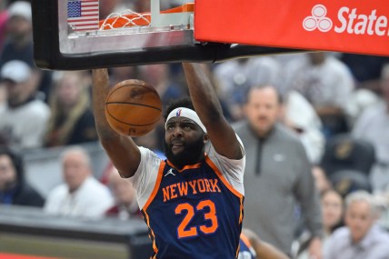 Apr 15, 2023; Cleveland, Ohio, USA; New York Knicks center Mitchell Robinson (23) dunks against the Cleveland Cavaliers in the first quarter of game one of the 2023 NBA playoffs at Rocket Mortgage FieldHouse. Mandatory Credit: David Richard-Imagn Images