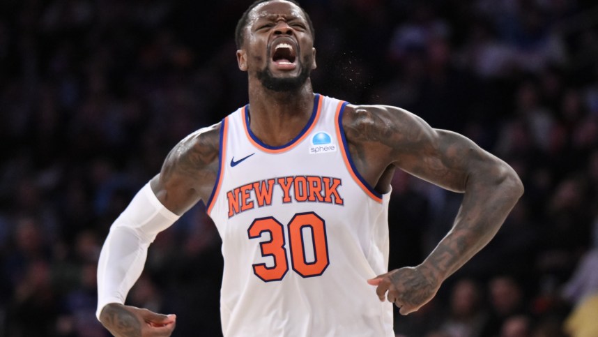 Dec 11, 2023; New York, New York, USA; New York Knicks forward Julius Randle (30) reacts after a dunk against the Toronto Raptors during the fourth quarter at Madison Square Garden. Mandatory Credit: John Jones-Imagn Images