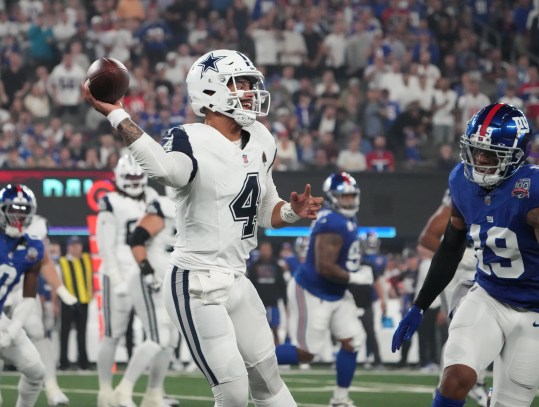 Sep 26, 2024; East Rutherford, New Jersey, USA;  Dallas Cowboys quarterback Dak Prescott (4) throws against the New York Giants in the first quarter at MetLife Stadium. Mandatory Credit: Robert Deutsch-Imagn Images