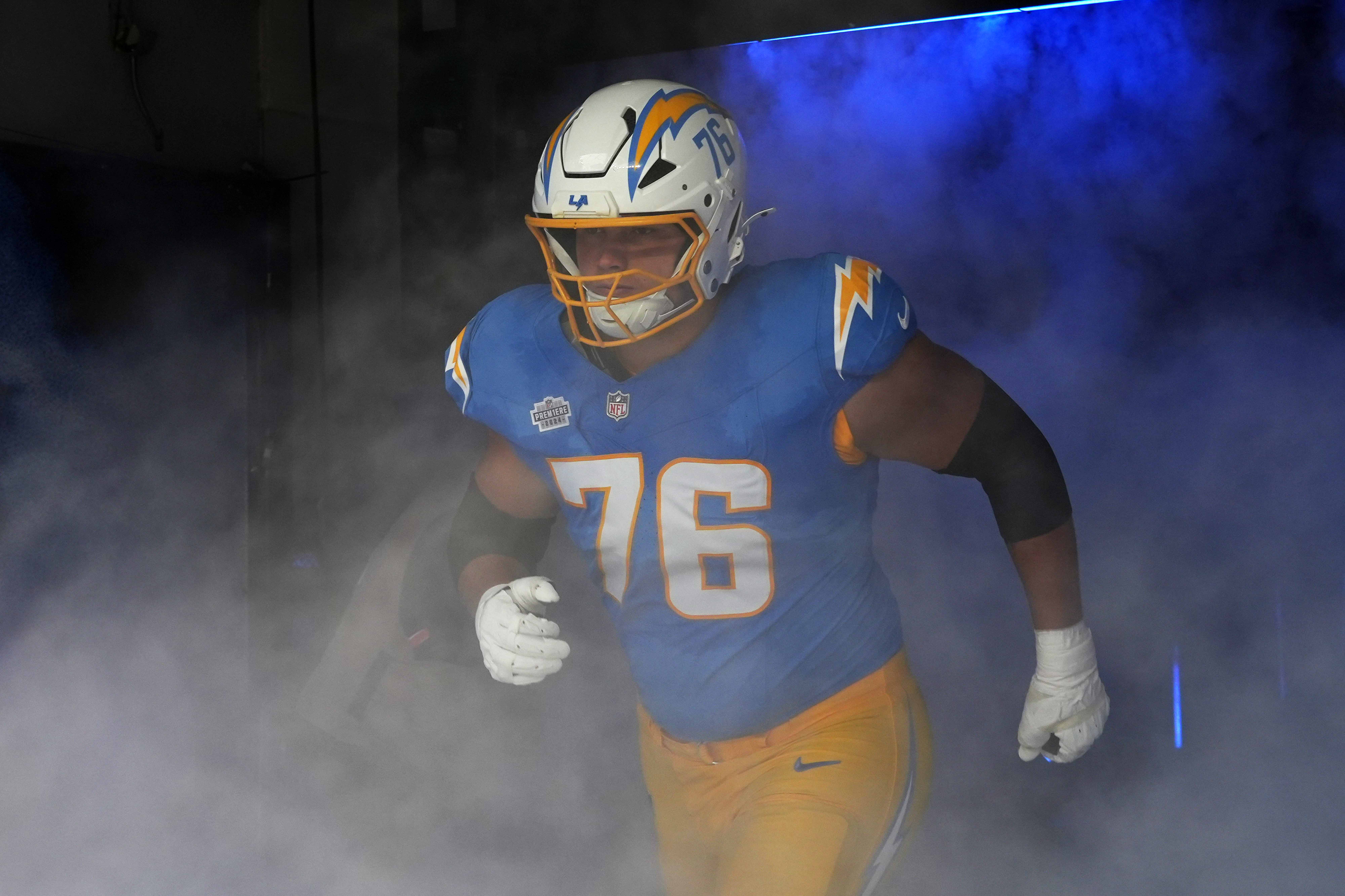 Sep 8, 2024; Inglewood, California, USA; Los Angeles Chargers offensive tackle Joe Alt (76) enters the field before the game against the Las Vegas Raiders at SoFi Stadium. Mandatory Credit: Kirby Lee-Imagn Images