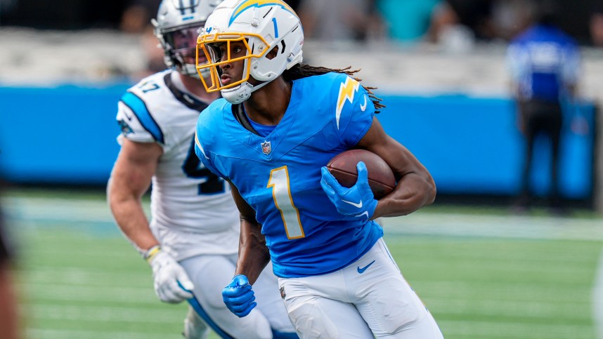 Sep 15, 2024; Charlotte, North Carolina, USA; Los Angeles Chargers wide receiver Quentin Johnston (1) runs against the Carolina Panthers during the second half at Bank of America Stadium. Mandatory Credit: Jim Dedmon-Imagn Images