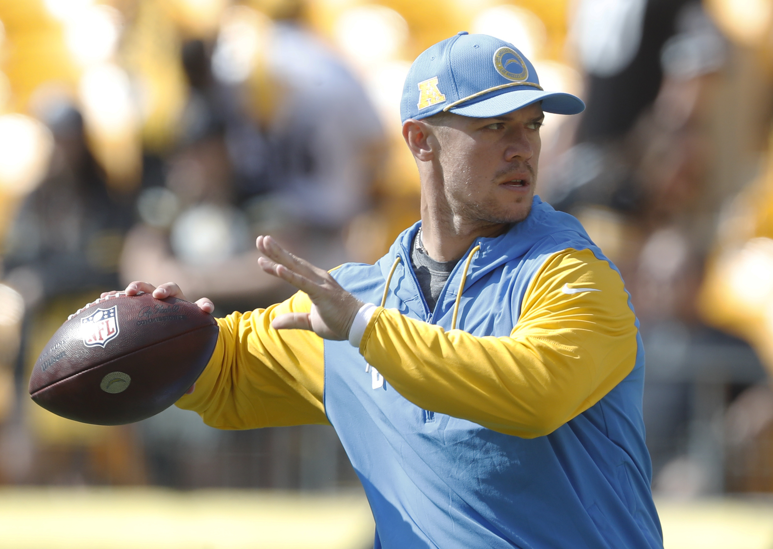 Sep 22, 2024; Pittsburgh, Pennsylvania, USA;  Los Angeles Chargers quarterback Taylor Heinicke (8) warms up against the Pittsburgh Steelers at Acrisure Stadium. Mandatory Credit: Charles LeClaire-Imagn Images