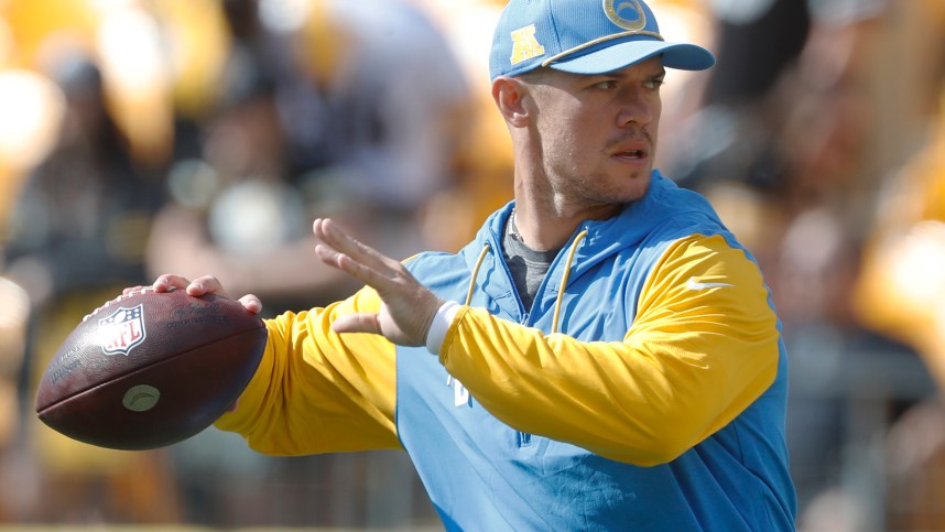 Sep 22, 2024; Pittsburgh, Pennsylvania, USA;  Los Angeles Chargers quarterback Taylor Heinicke (8) warms up against the Pittsburgh Steelers at Acrisure Stadium. Mandatory Credit: Charles LeClaire-Imagn Images