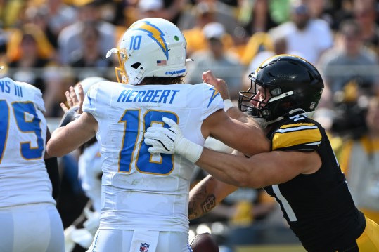 Sep 22, 2024; Pittsburgh, Pennsylvania, USA; Pittsburgh Steelers linebacker Nick Herbig (51) sacks Los Angeles Chargers quarterback Justin Herbert (10) during the third quarter at Acrisure Stadium. Mandatory Credit: Barry Reeger-Imagn Images