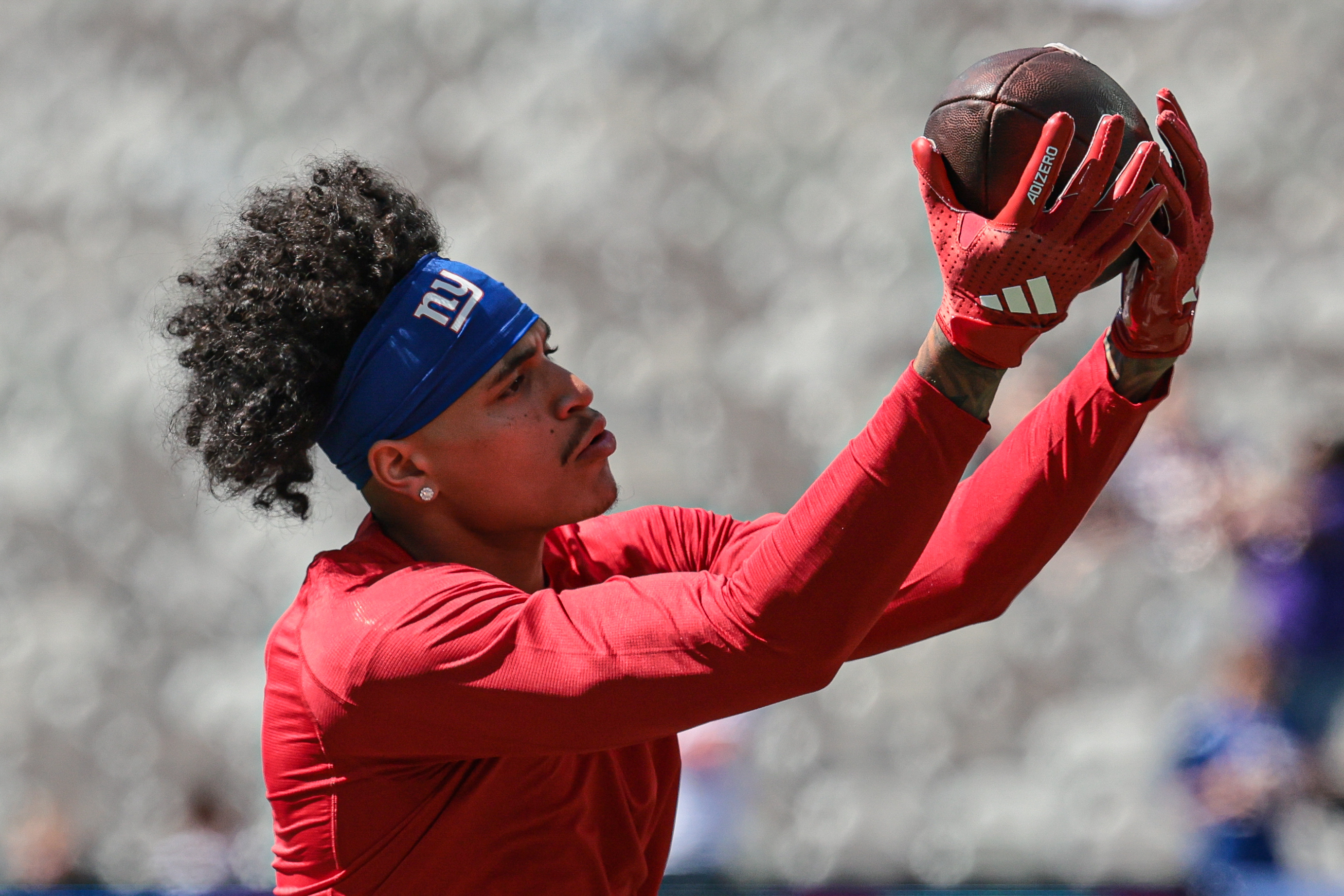 Sep 8, 2024; East Rutherford, New Jersey, USA; New York Giants wide receiver Jalin Hyatt (13) warms up before the game against the Minnesota Vikings at MetLife Stadium. Mandatory Credit: Vincent Carchietta-Imagn Images