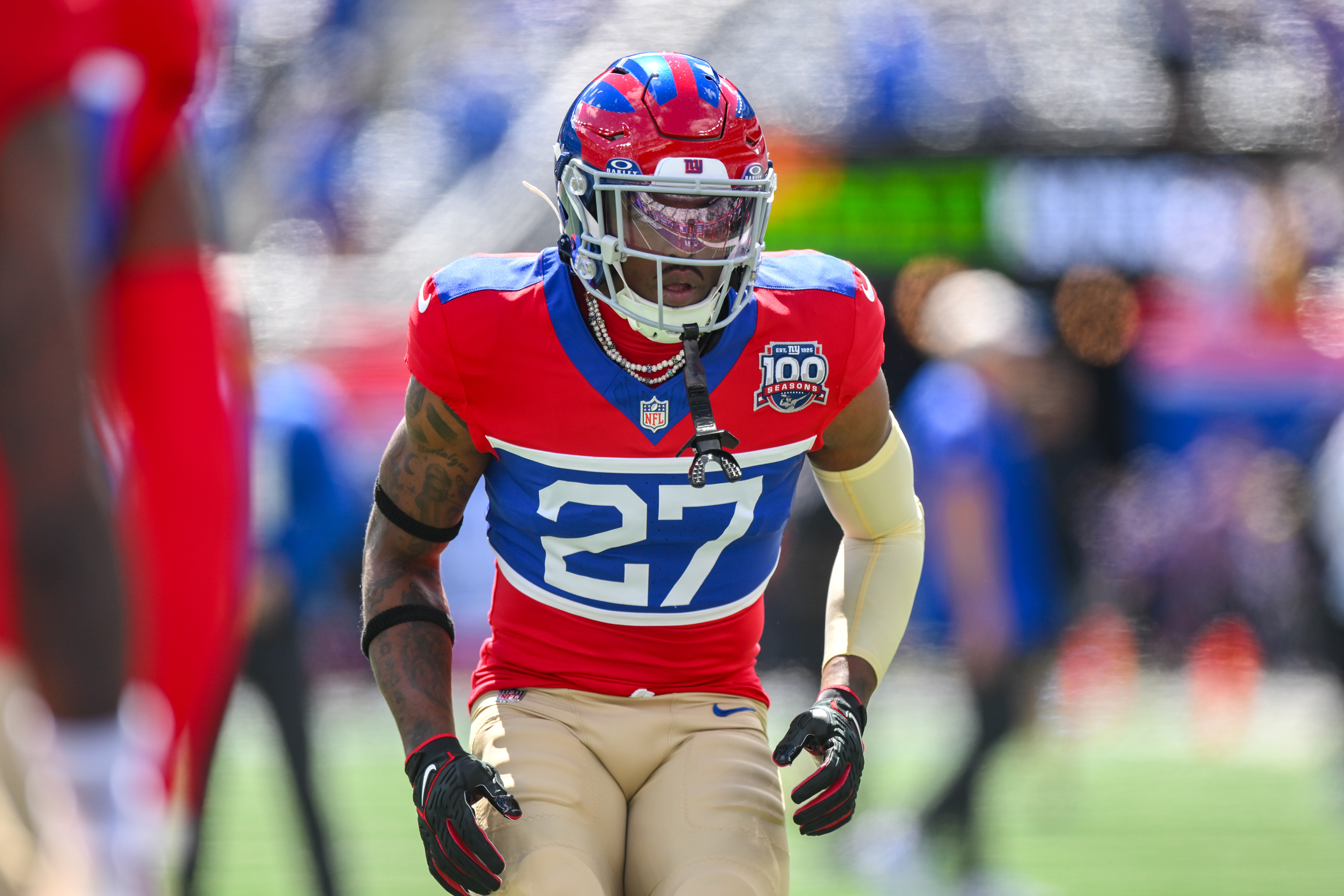 Sep 8, 2024; East Rutherford, New Jersey, USA; New York Giants safety Jason Pinnock (27) warms up before a game against the Minnesota Vikings at MetLife Stadium. Mandatory Credit: John Jones-Imagn Images