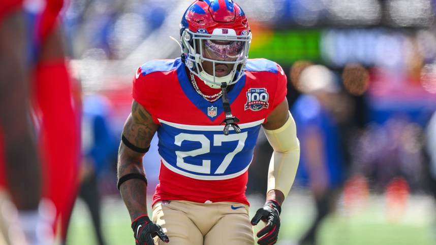 Sep 8, 2024; East Rutherford, New Jersey, USA; New York Giants safety Jason Pinnock (27) warms up before a game against the Minnesota Vikings at MetLife Stadium. Mandatory Credit: John Jones-Imagn Images