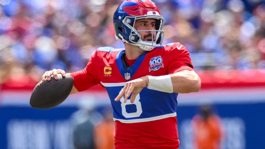 Sep 8, 2024; East Rutherford, New Jersey, USA; New York Giants quarterback Daniel Jones (8) throws a pass against the Minnesota Vikings during the first half at MetLife Stadium. Mandatory Credit: John Jones-Imagn Images