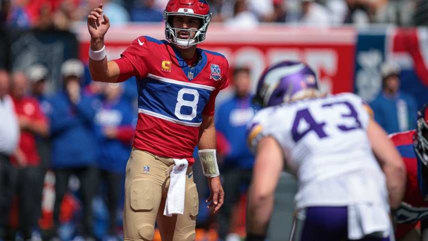 Sep 8, 2024; East Rutherford, New Jersey, USA; New York Giants quarterback Daniel Jones (8) signals during the first half against the Minnesota Vikings at MetLife Stadium. Mandatory Credit: Vincent Carchietta-Imagn Images