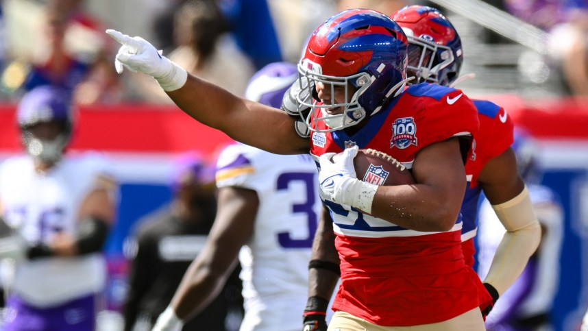 Sep 8, 2024; East Rutherford, New Jersey, USA; New York Giants linebacker Darius Muasau (53) reacts after an interception against the Minnesota Vikings during the second half at MetLife Stadium. Mandatory Credit: John Jones-Imagn Images