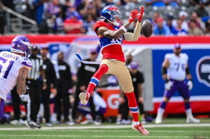 Sep 8, 2024; East Rutherford, New Jersey, USA; New York Giants wide receiver Jalin Hyatt (13) is unable to catch a pass as Minnesota Vikings linebacker Blake Cashman (51) pursues during the second half at MetLife Stadium. Mandatory Credit: John Jones-Imagn Images