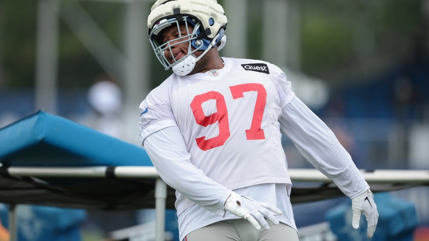 Jul 24, 2024; East Rutherford, NJ, USA; New York Giants defensive tackle Dexter Lawrence II (97) participates in drills during training camp at Quest Diagnostics Training Facility. Mandatory Credit: Vincent Carchietta-Imagn Images